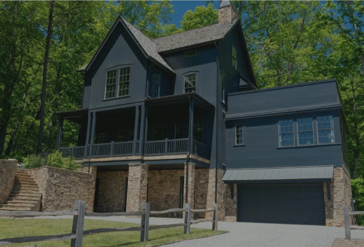 A custom dark-clad luxury home built by leaders in the building industry